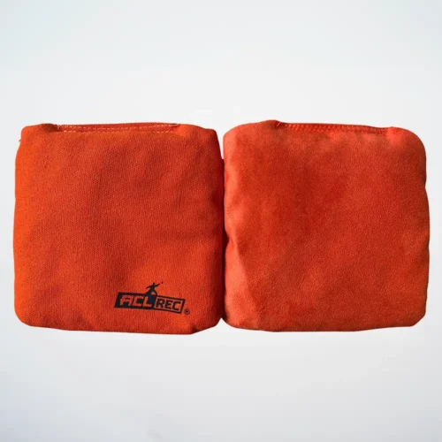 Orange cornhole bags Stick and Slide 1