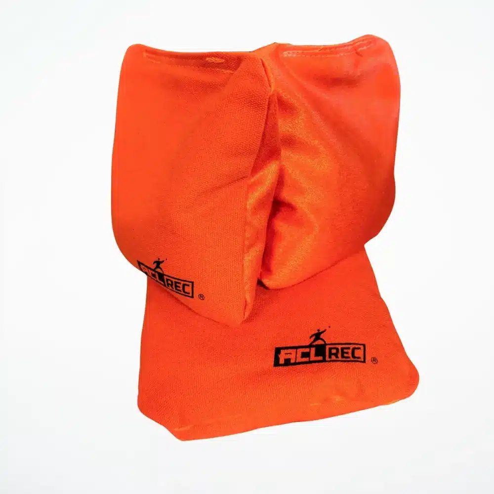 Orange cornhole bags Stick and Slide